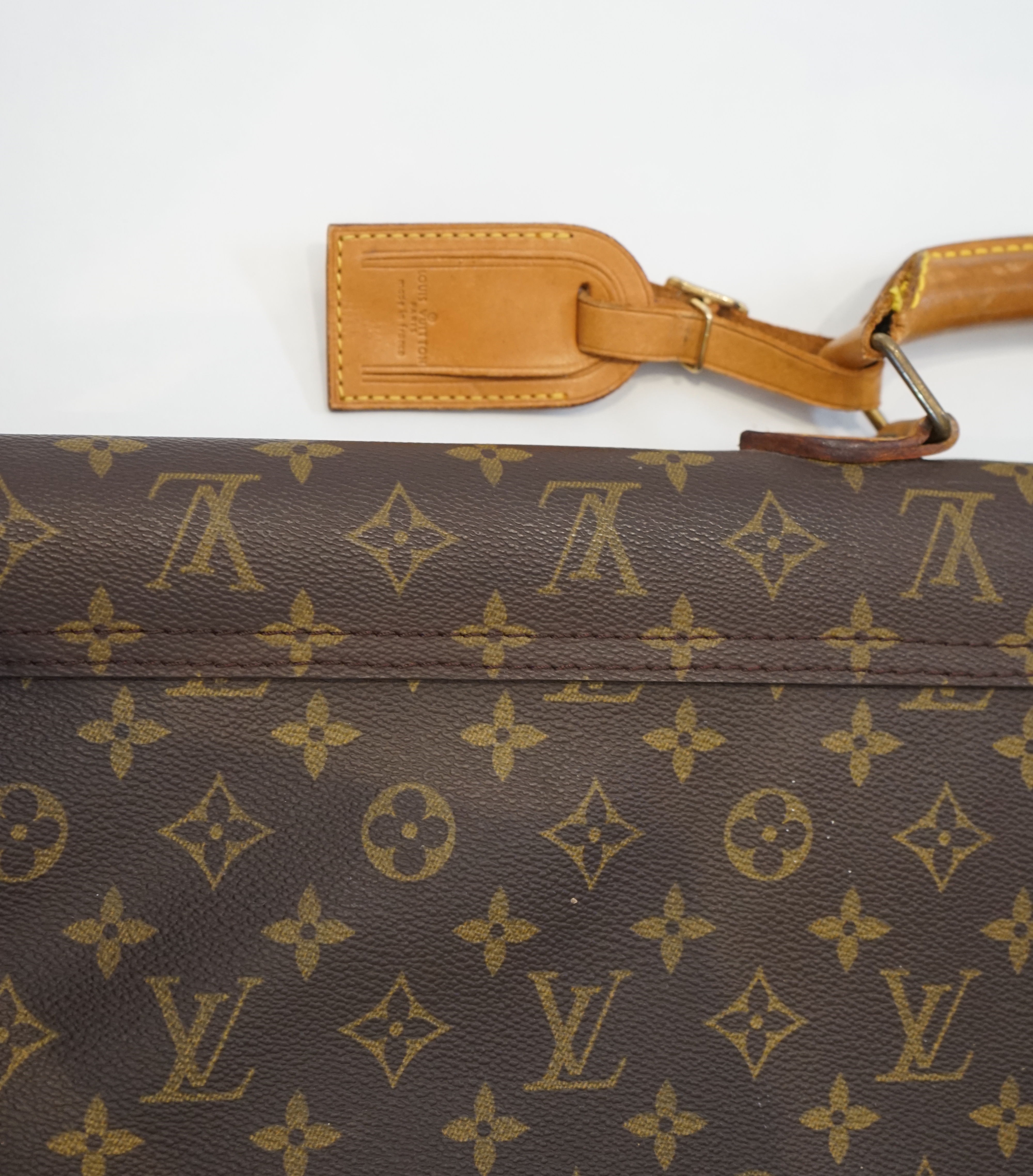 A Louis Vuitton special order folio case width 90cm, depth 4cm, height 63cm